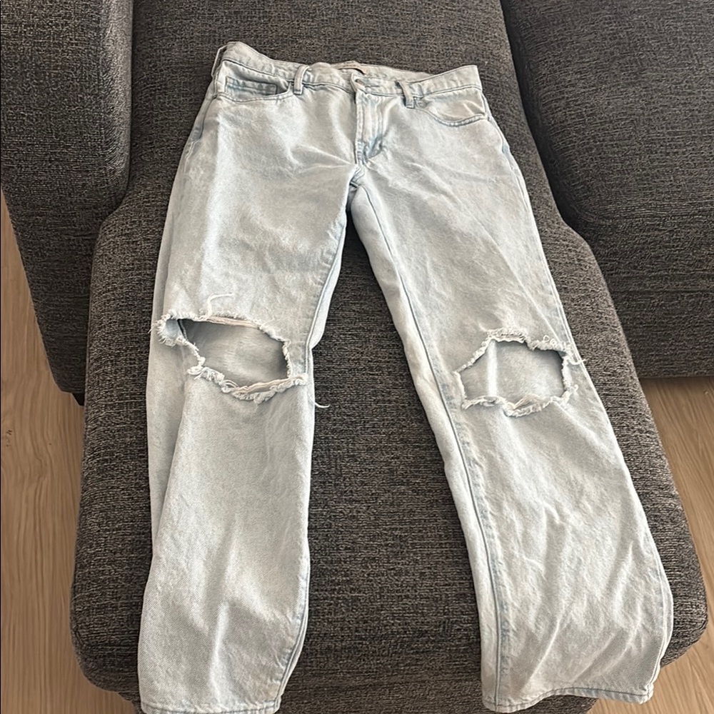 Distressed Light Wash Denim Jeans